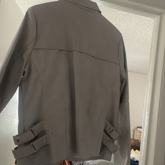A new, never worn before gray jacket. - Picture 2 of 2